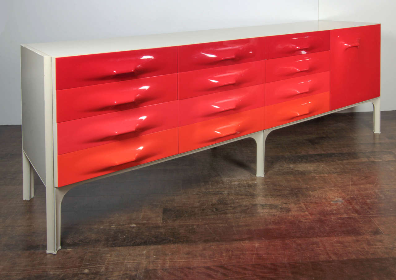 A Raymond Loewy credenza made in France by Doubinski Freres around 1970, in four shades of injection-molded plastic, painted wood, steel, and laminate.