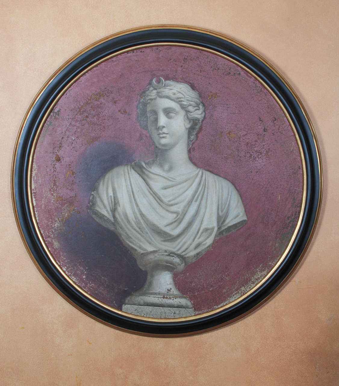 A pair of English trompe l'oeil paintings, probably by an Italian hand, of busts of Jupiter and Diana. Acquired in the 1980s by Gassar Tabakoglu, an associate of the decorator Renzo Mongiardino, from Carlton Hobbs, they then entered the collection