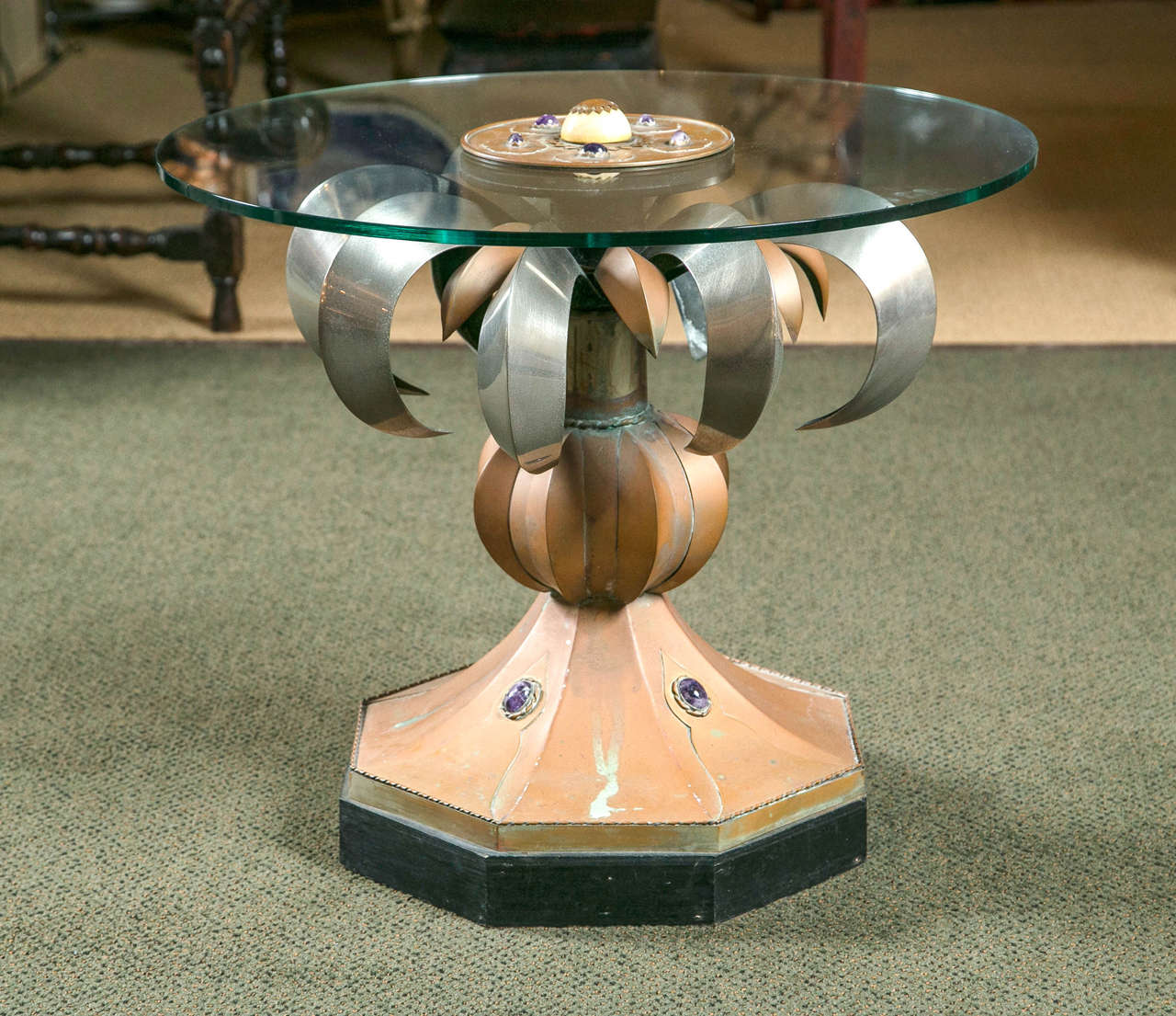 An Anthony Redmile novelty mixed metal, chrome and patinated copper, amethyst adorned table with glass top affixed with bone and decorative metal.