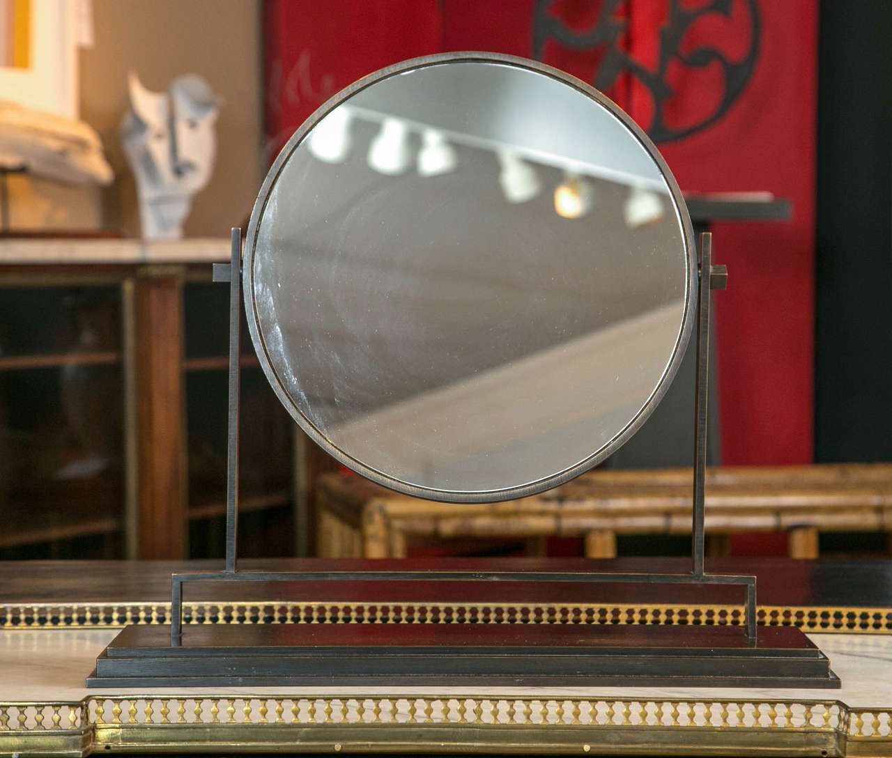A heavy solid bronze vanity or tabletop mirror possibly by Karl Springer. Superior quality manufacture, unmarked, circa 1970-1980s.