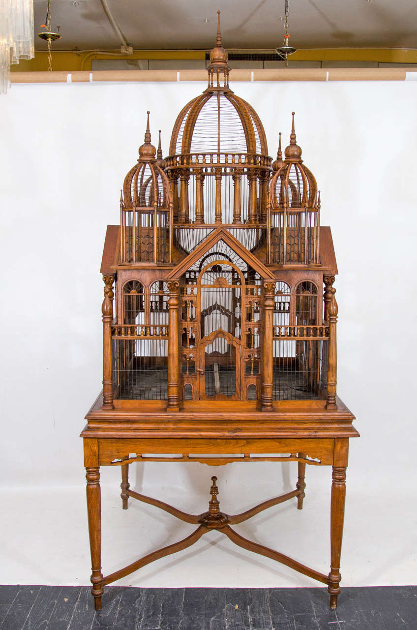 Very impressive bird cage in a very grand scale! The piece has exquisite details and craftsmanship. The bird cage 