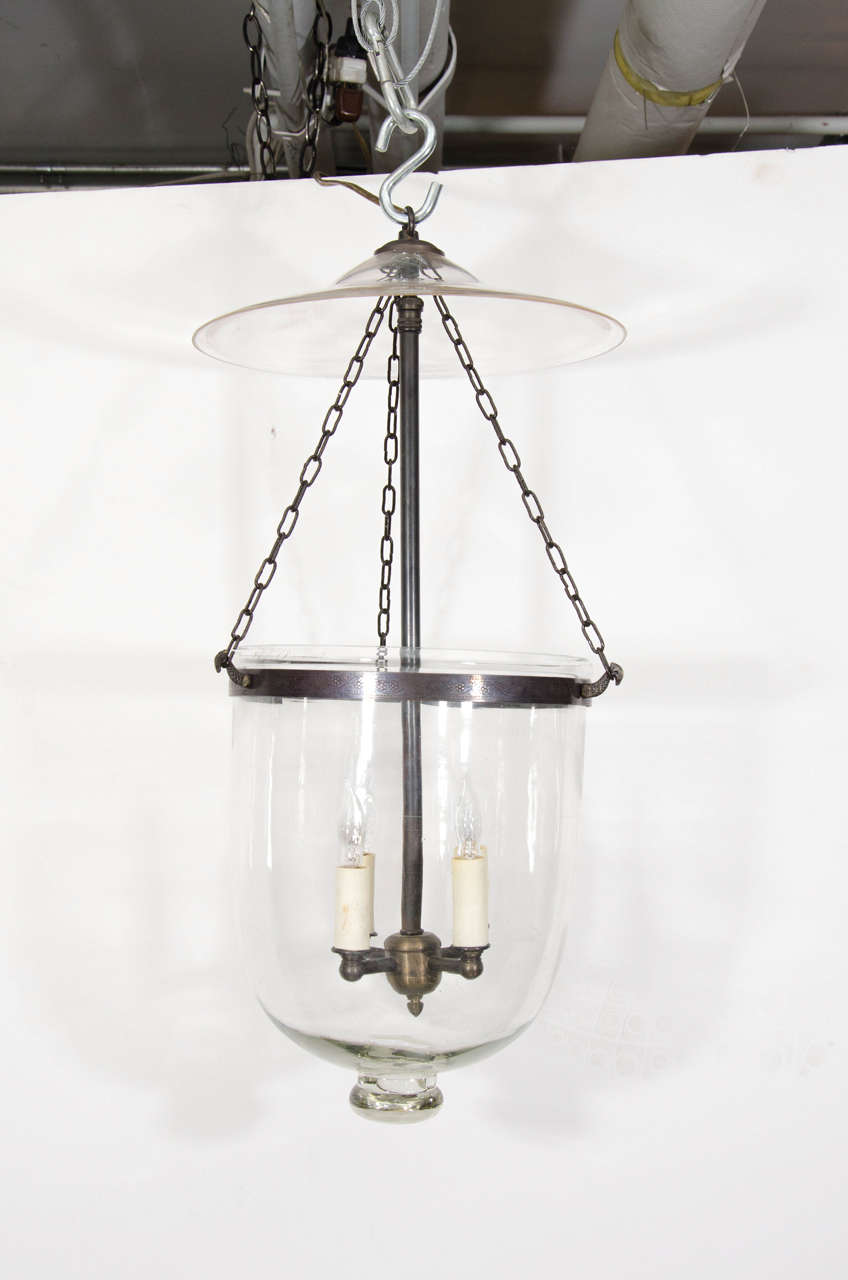 Small bell jar light with clear glass. Newly wired and ready to hang.