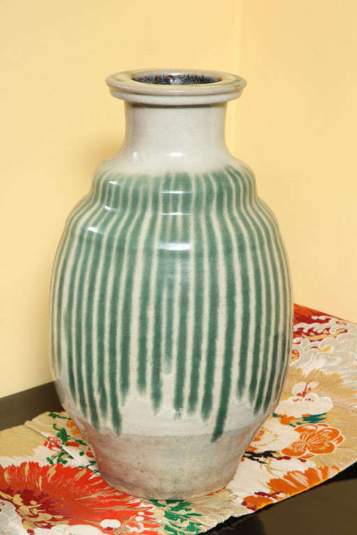 Ceramic wine ( sake ) jar with green drip glaze on off-white ground. Classic Shigaraki ware. Japan, 19th Century