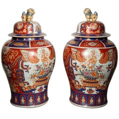 A PAIR OF PORCELAIN COVERED JARS. JAPANESE, 20th CENTURY
