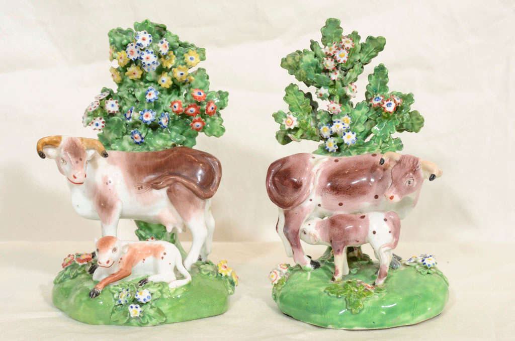A pair of 18th century Derby porcelain cows with their calves.
A similar Derby model is in the collection of the Hastings Museum and Art Gallery, Hastings Sussex (See 