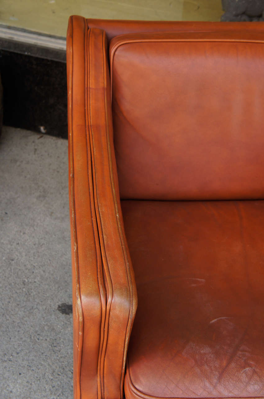 Mid-Century Modern A Pair of Danish Modern Leather Upholstered Club Chairs