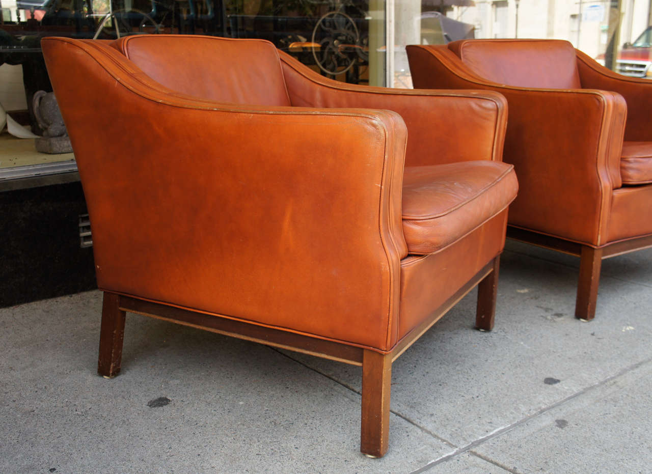A Pair of Danish Modern Leather Upholstered Club Chairs at 1stDibs