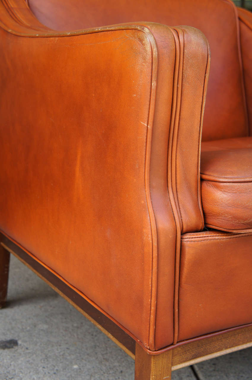 A Pair of Danish Modern Leather Upholstered Club Chairs at 1stDibs