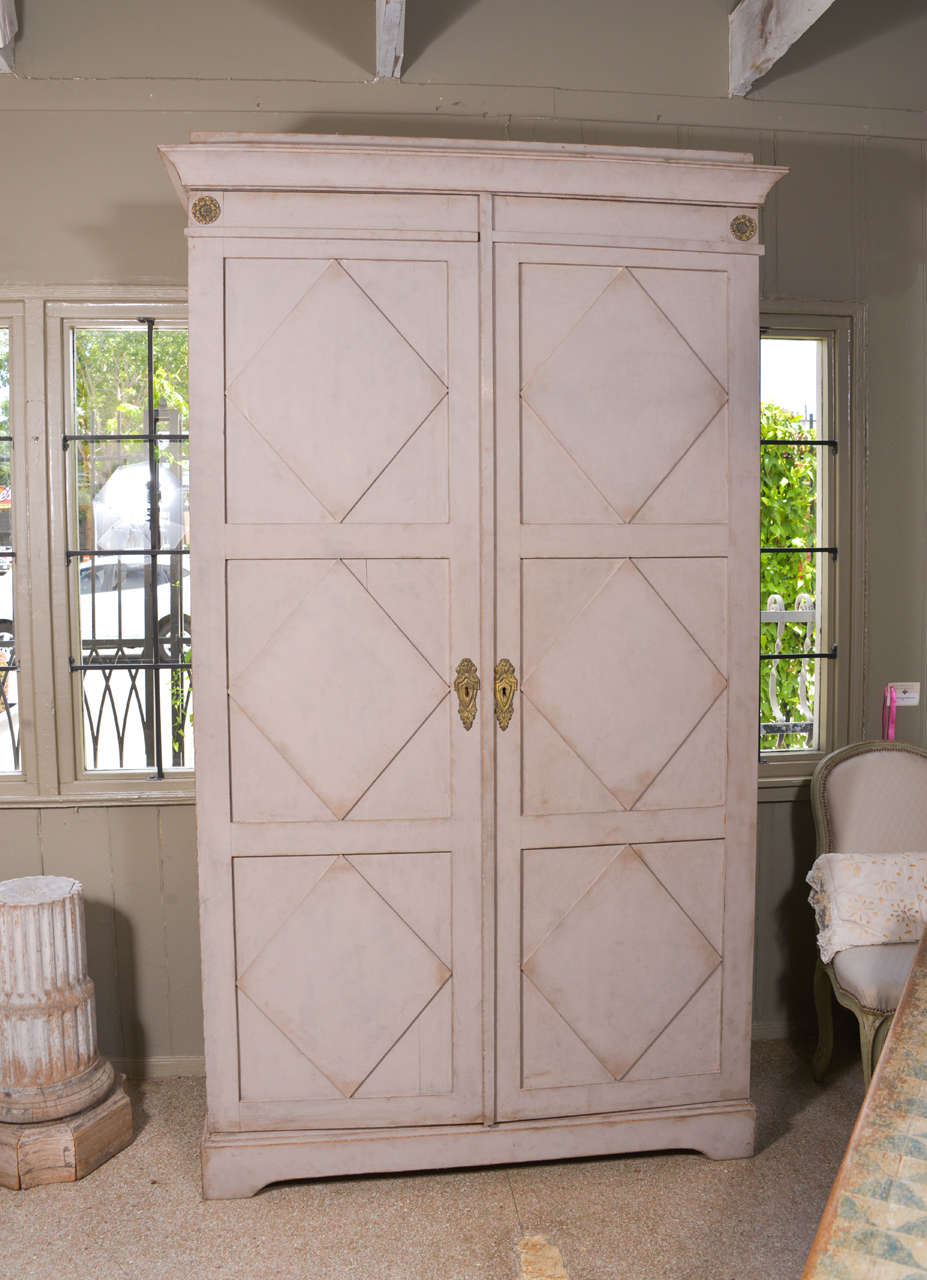 Painted two-door cabinet.
Interior never painted.
Very charming.
Simple and elegant.