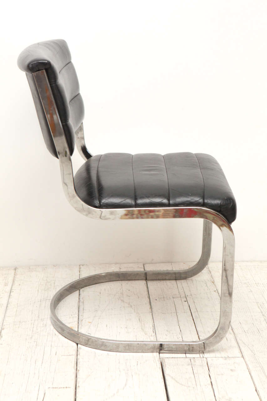 Set of Four Ribbed Black Leather and Chrome Cantilever Dining Chairs In Fair Condition In Los Angeles, CA