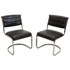 Set of Four Ribbed Black Leather and Chrome Cantilever Dining Chairs