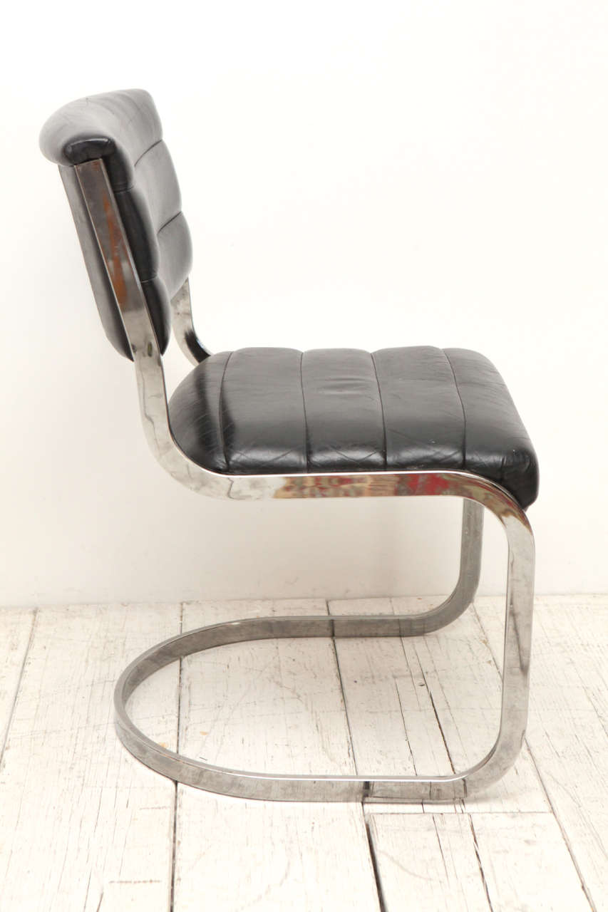 Set of Four Ribbed Black Leather and Chrome Cantilever Dining Chairs at