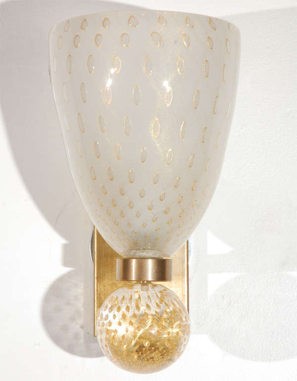 Pair of Murano sconces with beautiful drip details.