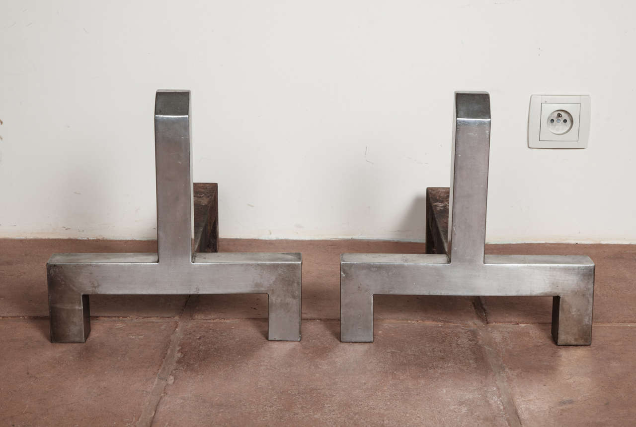 1970s brushed steel pair of andirons with a very pure design by Francois Monet.