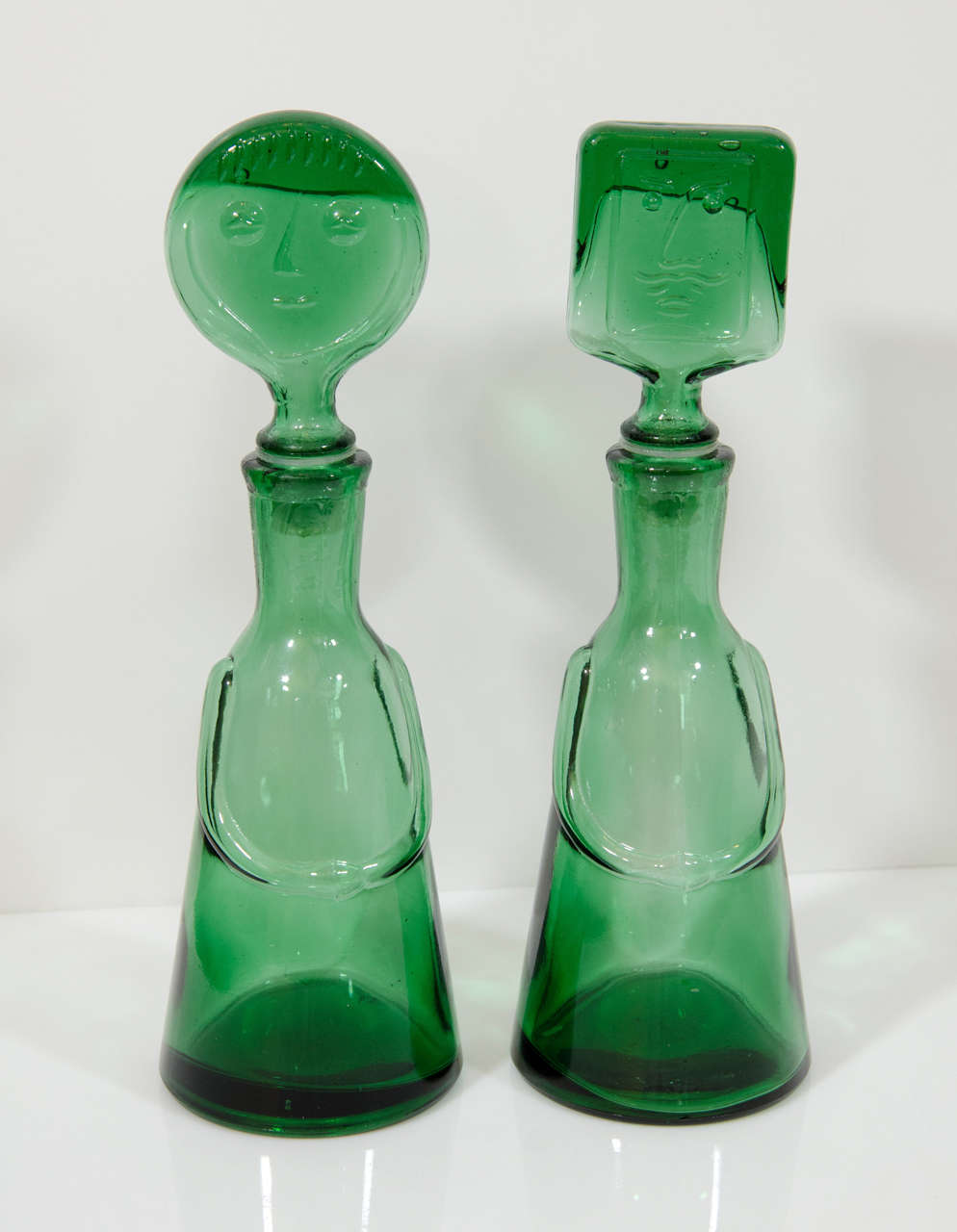 Charming pair of decanters from Erik Hoglund's "People" series. Please contact for location. Offered by Las Venus by Kenneth Clark, New York City.
