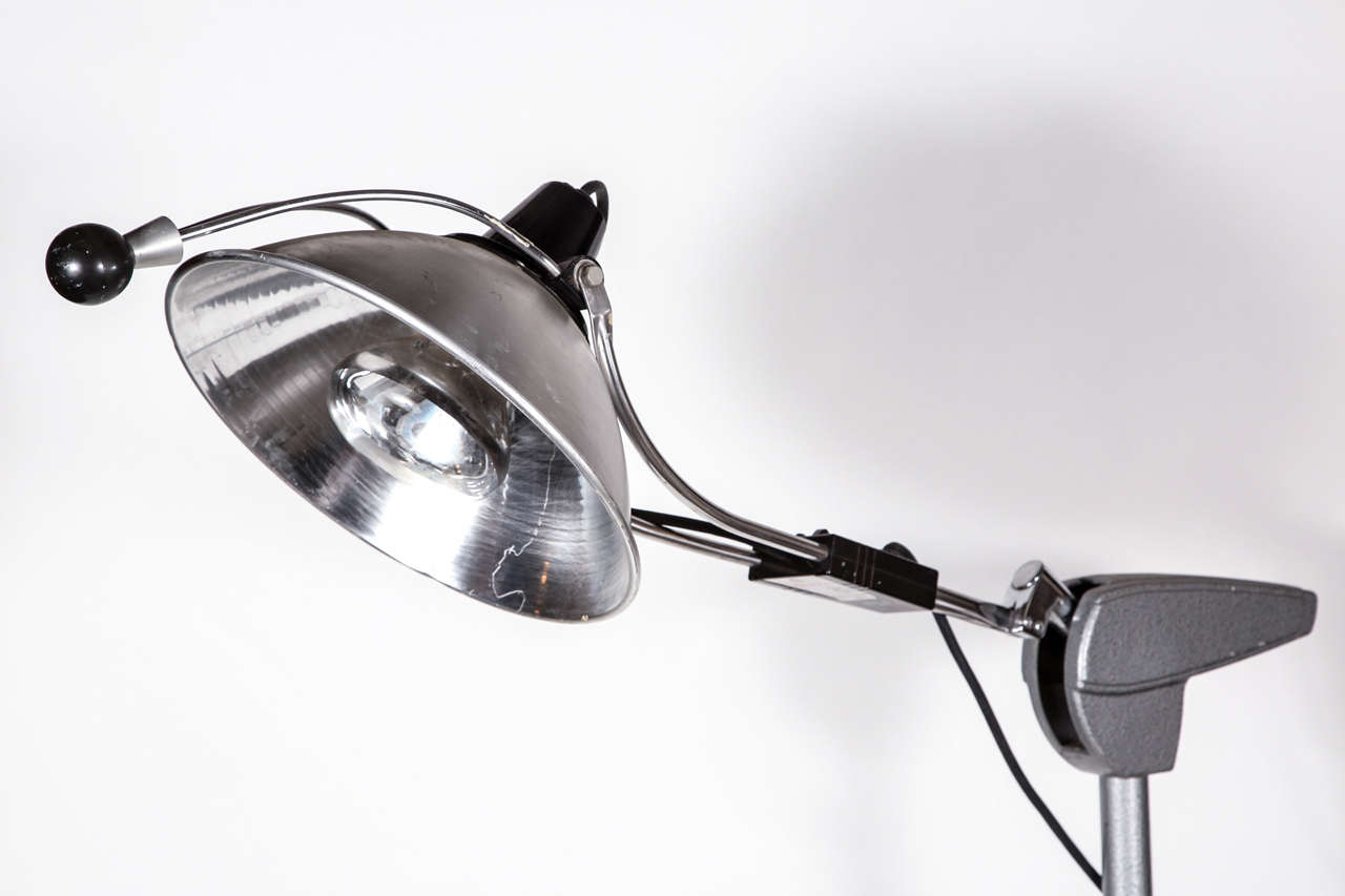 Lamp's head swivels in all directions. Note the Mid-Century Modern ball handle.
This floor lamp was manufactured by Wilmot Castle Co. Founded in 1883, Wilmot Castle Co., of Rochester, NY, manufactured laboratory, medical, dental and hospital