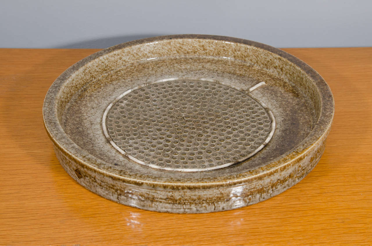 1960's textured ceramic platter in a green glaze.  Signed Rorstraand, Sweden.
