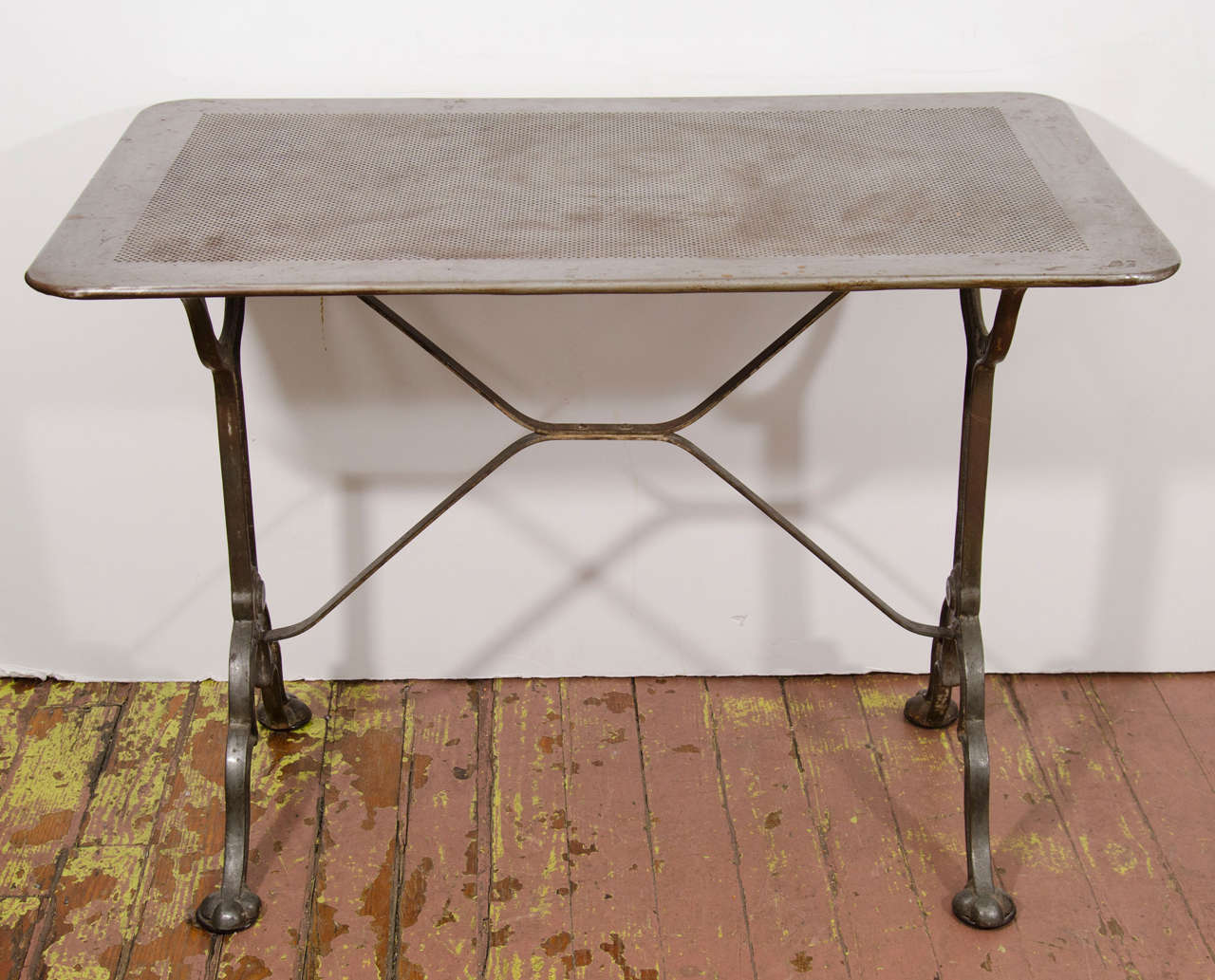 Perforated zinc top bistro table with rounded corners from the south of France