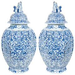 Pair of Dutch Delft Blue and White Covered Vases