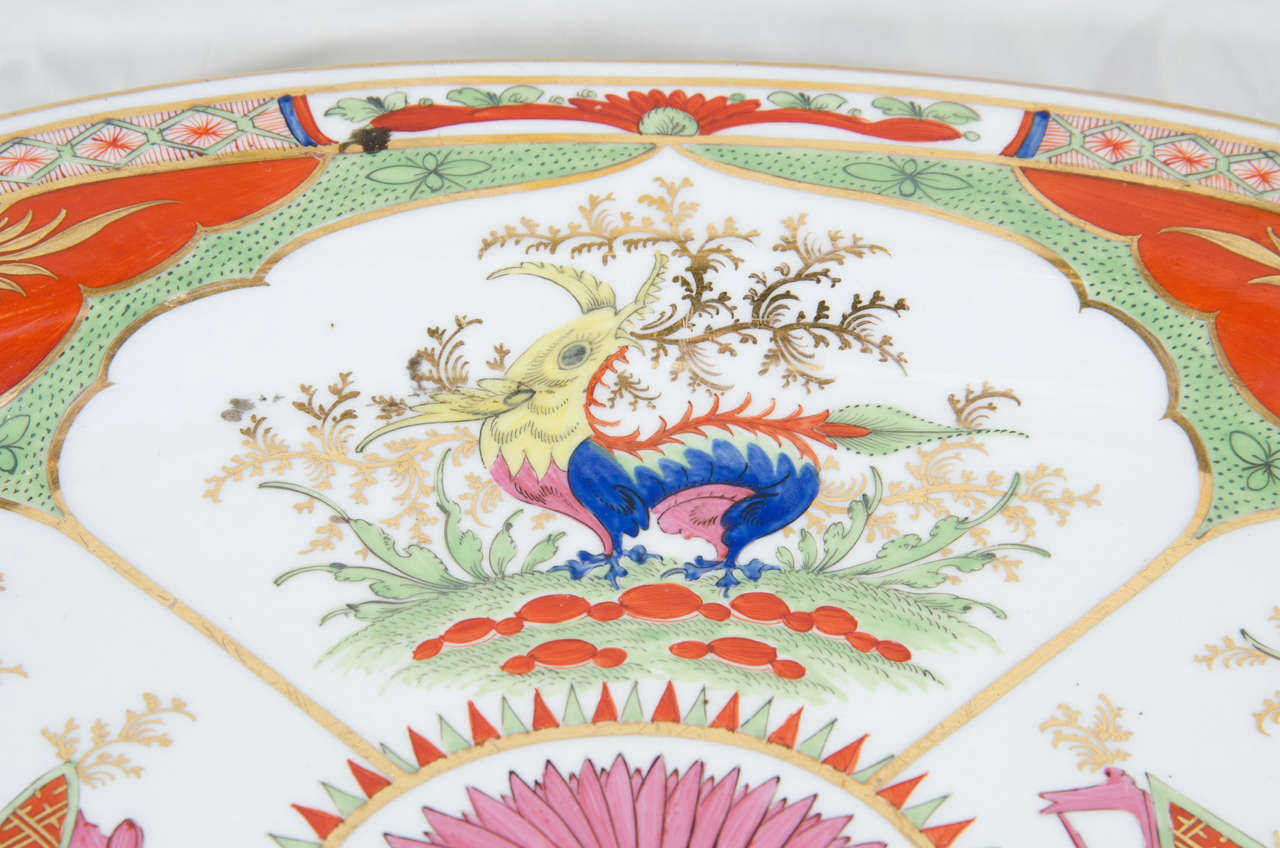A Chamberlain's Worcester platter in the Bengal tiger pattern
painted in the famille verte palette with four lappet-shaped panels showing mythical beasts alternating with flowering vases on tables.
Bengal Tiger was one of the most sought after