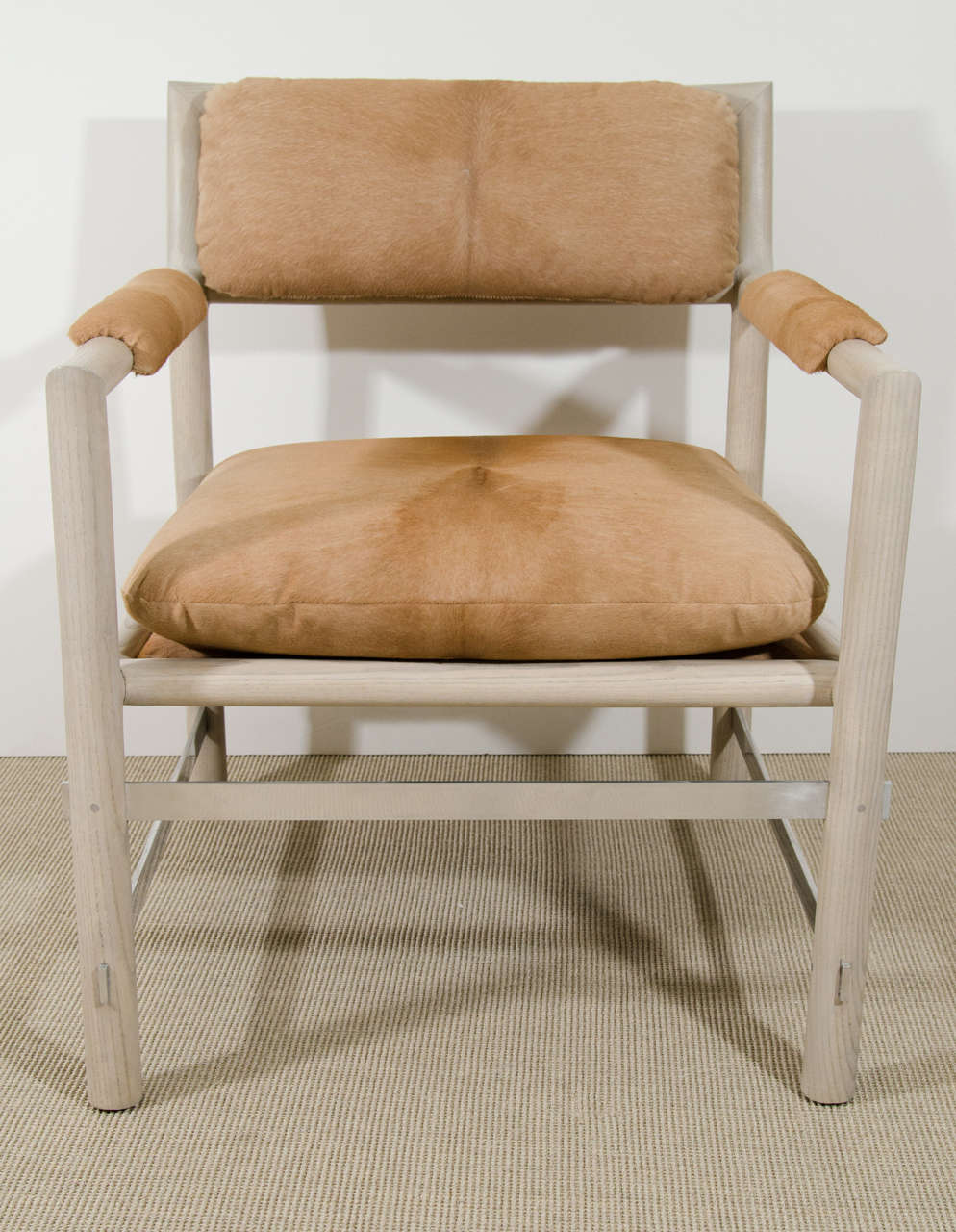 Pair of Edward Wormley for Dunbar cerused ash and stainless steel chairs reupholstered in cowhide, circa 1960, USA.