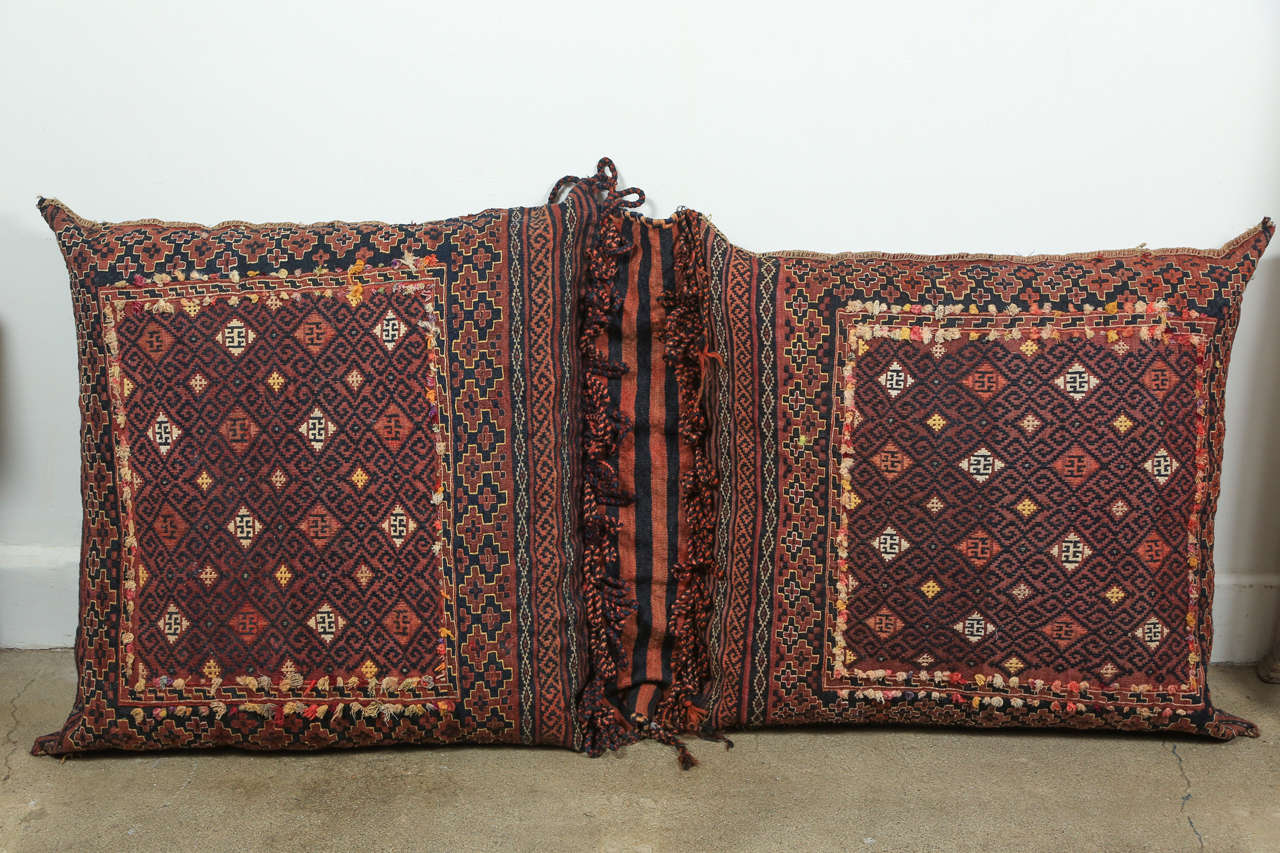 Antique Persian Double Floor Pillow Rug, very hard to find, double saddle bag tuned into floor kilim pillows.
High quality kilim weaving from the Baluch Tribes border of Afghanistan.
Dark saturated color palette.