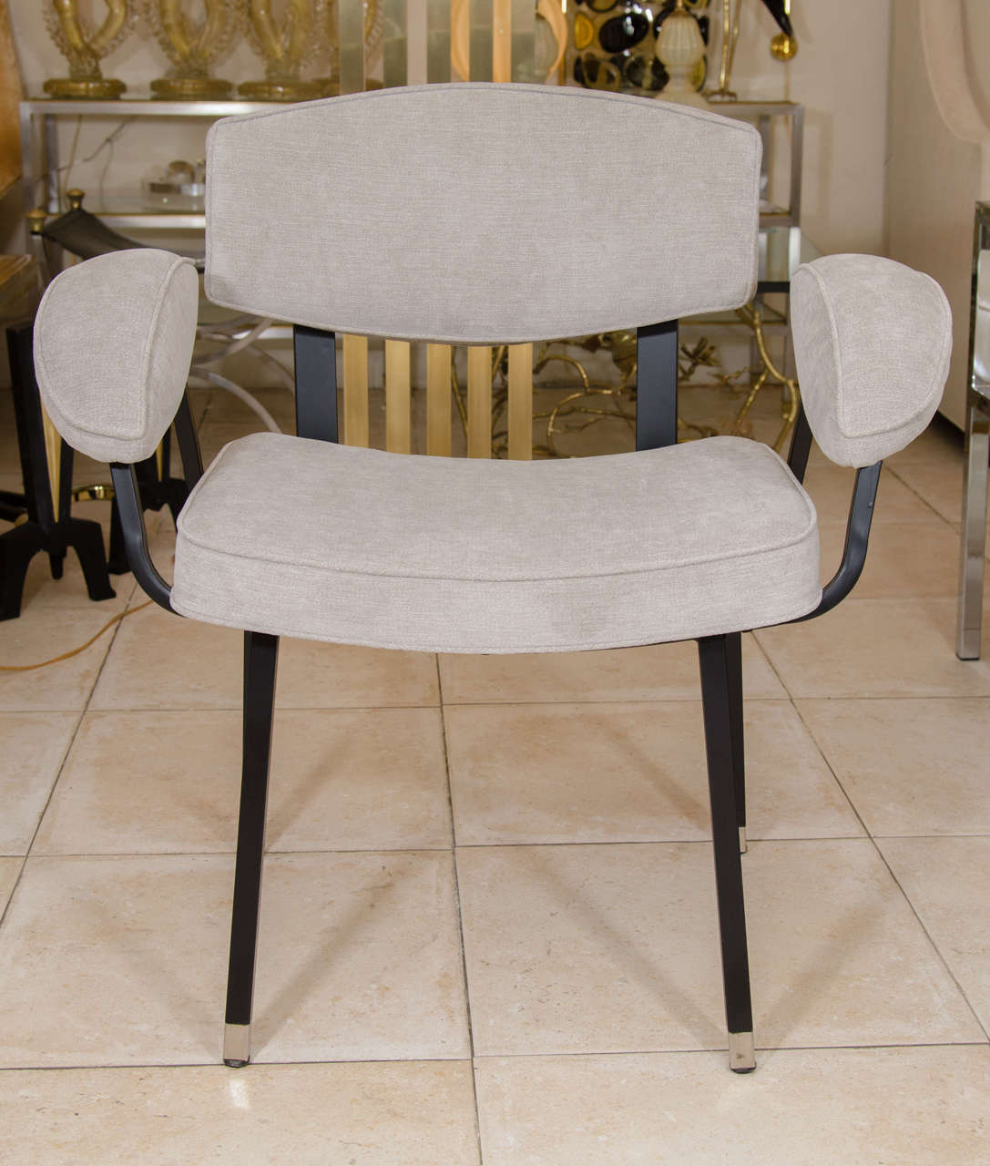 Upholstered dining armchair with black enameled metal frame and polished nickel details by Forma Nova, Italy.