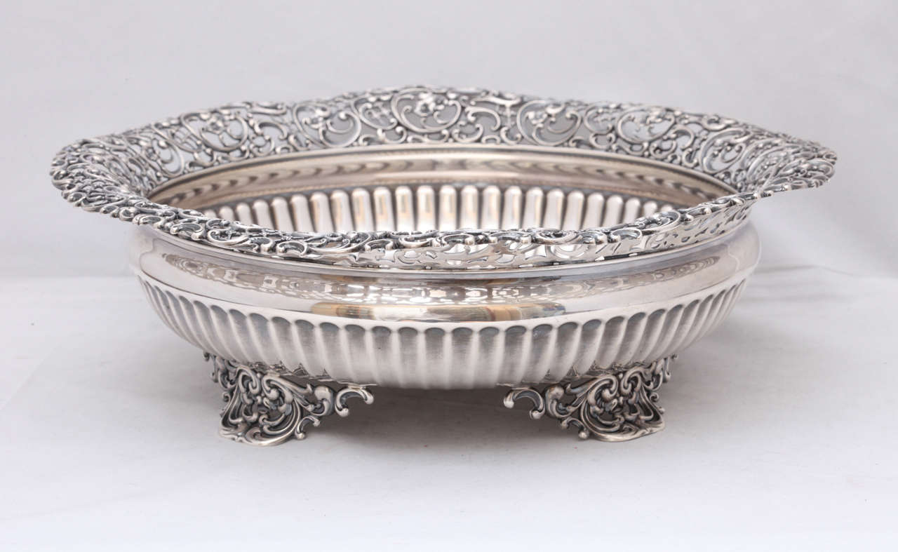 Sterling silver, Victorian, footed centerpiece bowl, Whiting Manufacturing Company, Providence, Rhode Island, circa 1880s-1890s. Measures 11 1/4 inches  diameter x 3 1/4 inches high; weighs 22.28 troy ounces. Lovely pierced border; border motif is