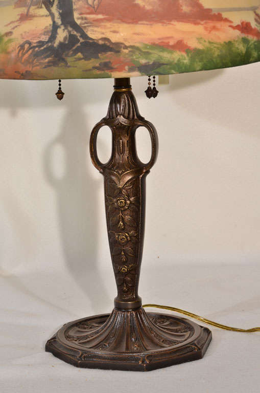 Iron Pair, matching Art Nouvou table lamps with obverse painted shade For Sale