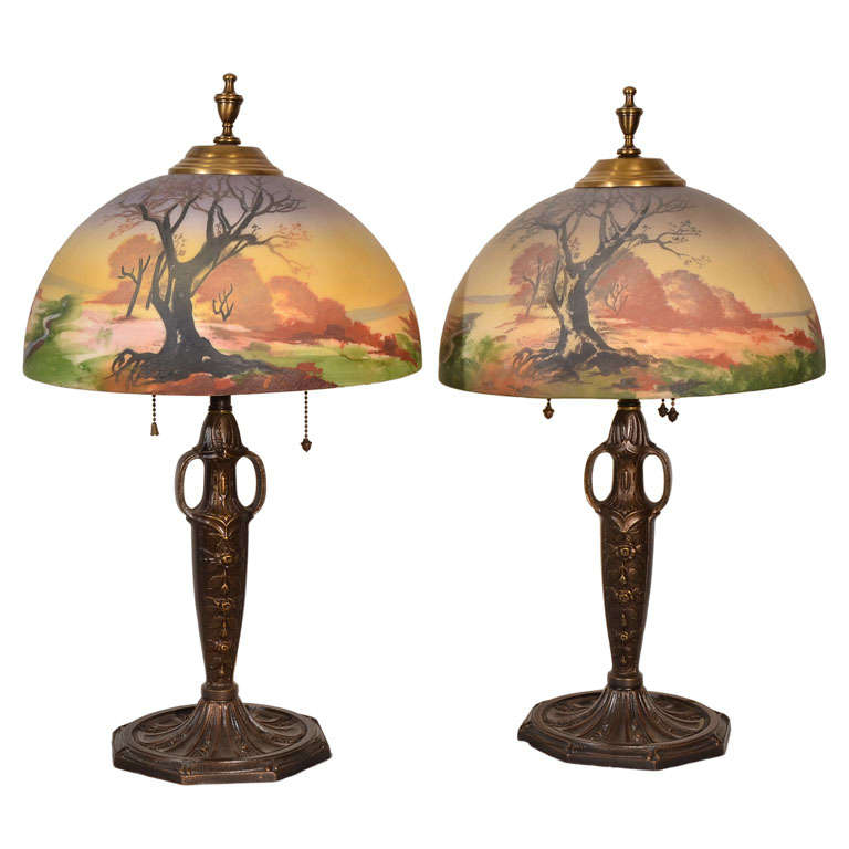 Pair, matching Art Nouvou table lamps with obverse painted shade For Sale