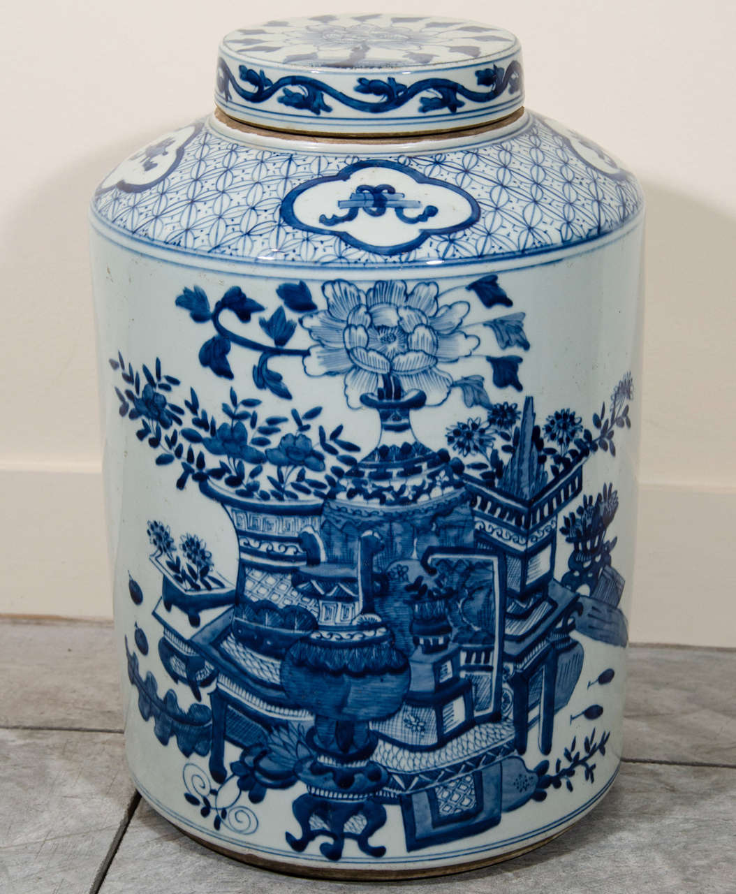 A beautifully decorated antique Chinese porcelain tea container, with Chinese calligraphy on the back. From Shanxi Province, circa 1880.