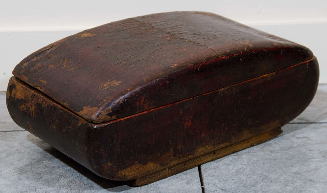 An unusually shaped and graceful weathered storage box, with beautiful lacquer patina.  From China, Shanxi Province, c. 1850.

BX470