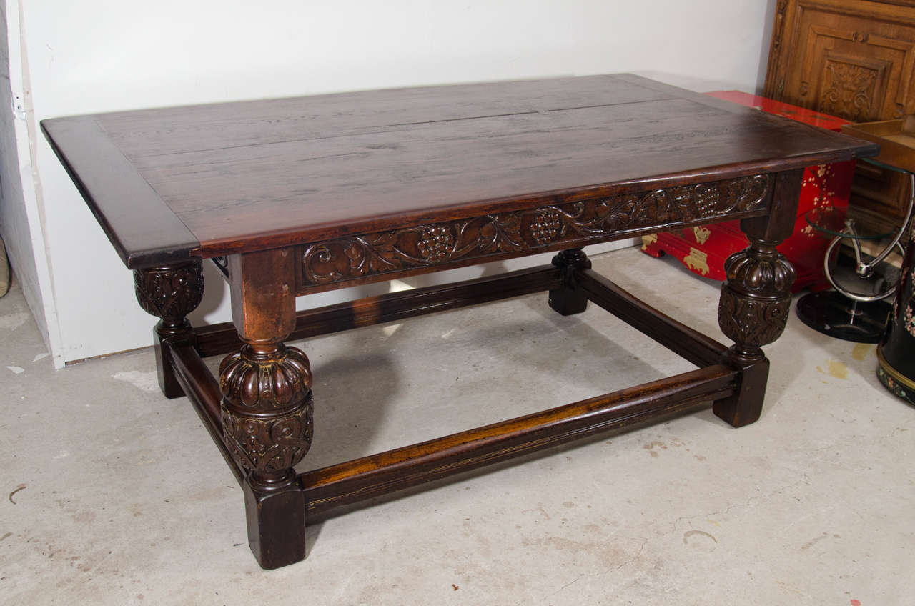 Beautiful late 17th century English rustic refectory table.  hand carved from the finest oak, distinctive hand carved legs and a well solid top. It has a walnut stain with it's original patina.