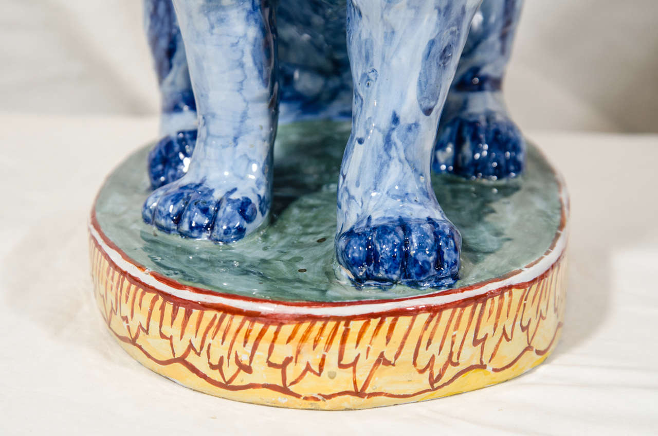 A Pair of Antique Faience Lions Painted in Polychrome Blue and Yellow 1