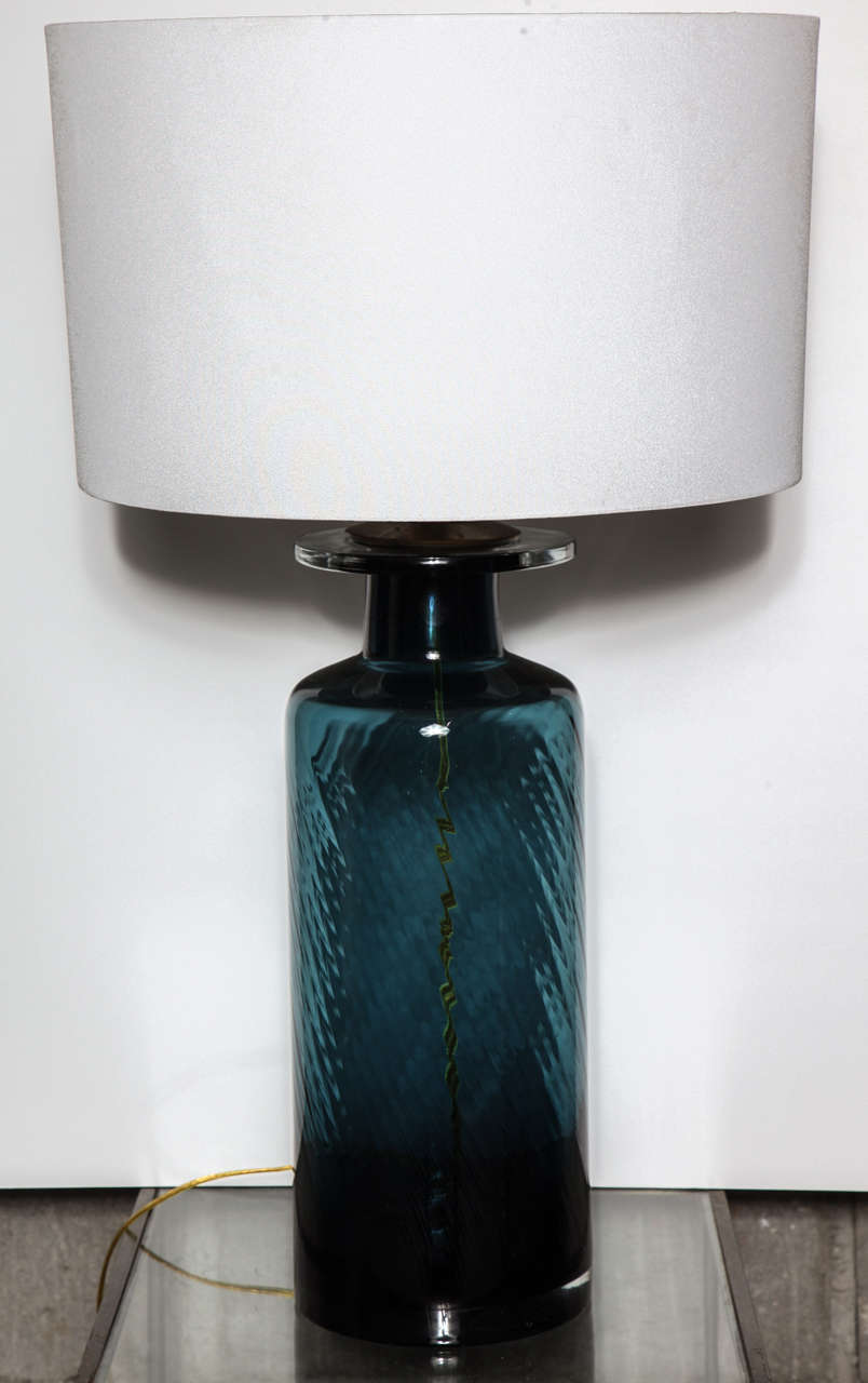 Beautiful teal blue with interesting textural pattern.  Base is 7