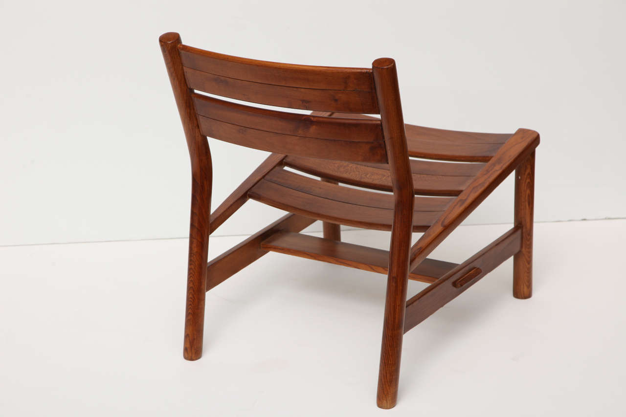 Pierre Gautier-Delaye, Pair of oak lounge chairs, France, c. 1950 4