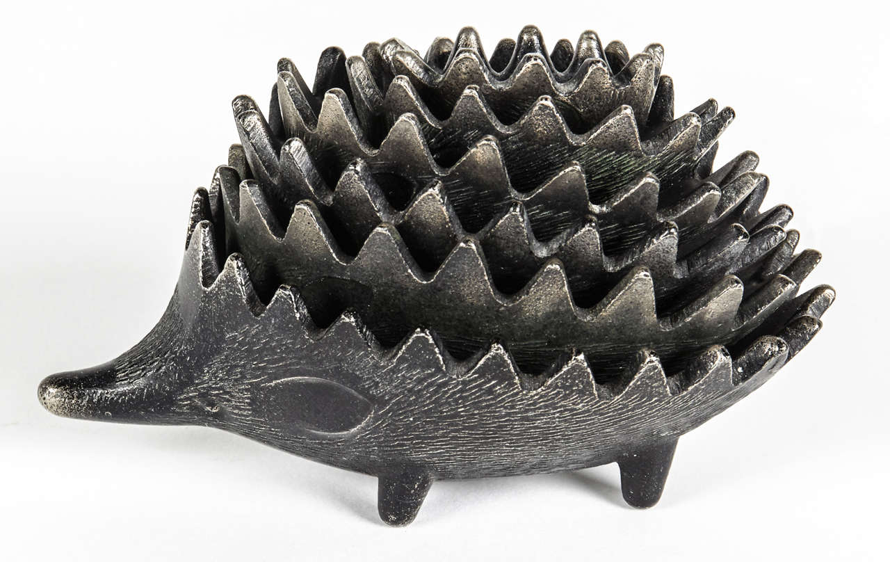 Whimsical hedgehog designed by Walter Bosse for Hertha Baller.  Circa 1950.

This vintage sculpture features a full set of the original six brass 