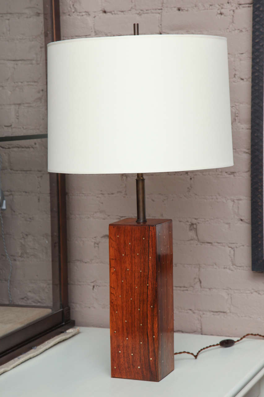 Square rosewood block table lamp with brass dot inlay on two side, rewired with new bronze-finished brass hardware circa 1950