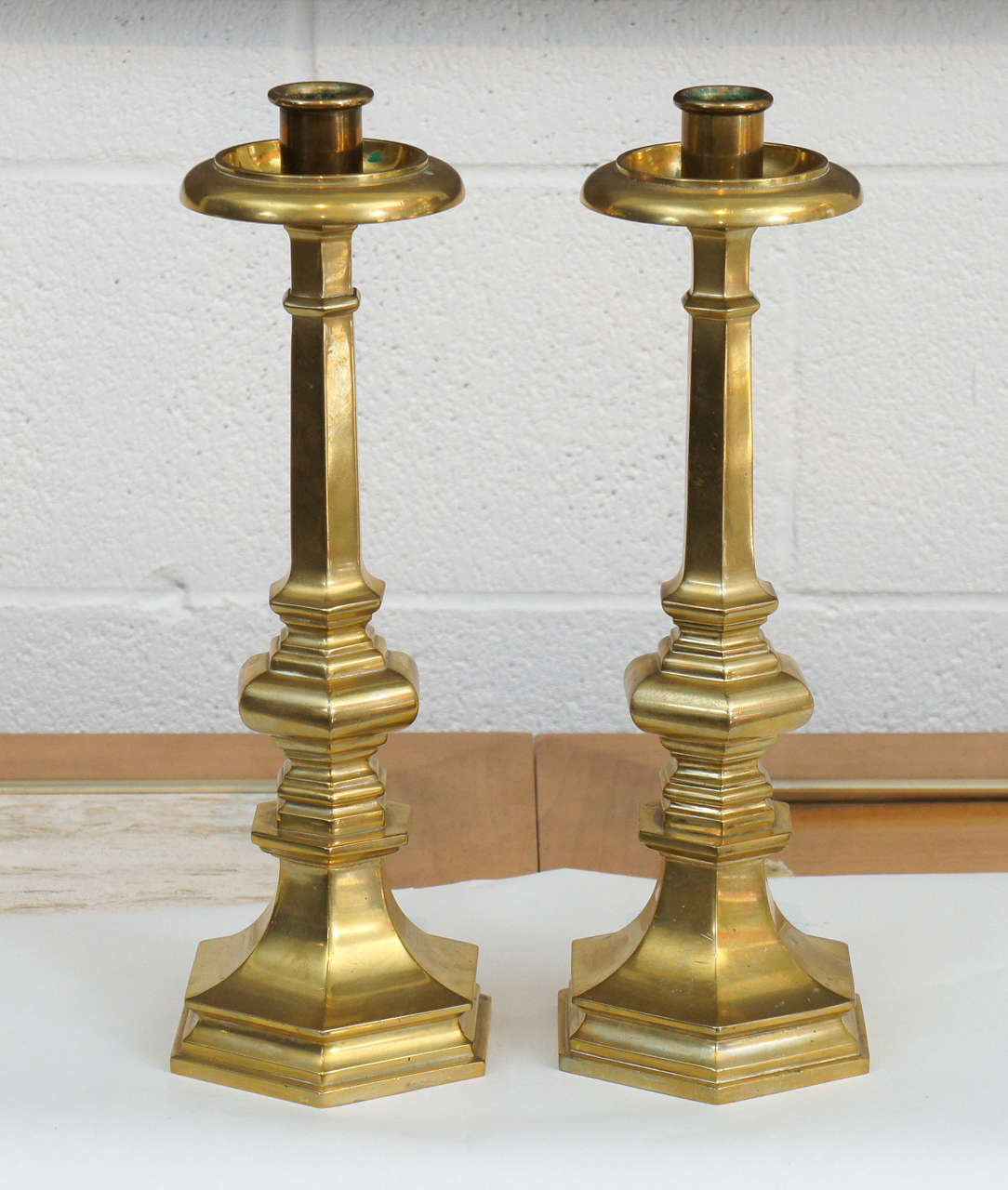 Here is a beautiful pair of Gorham solid brass candlesticks.