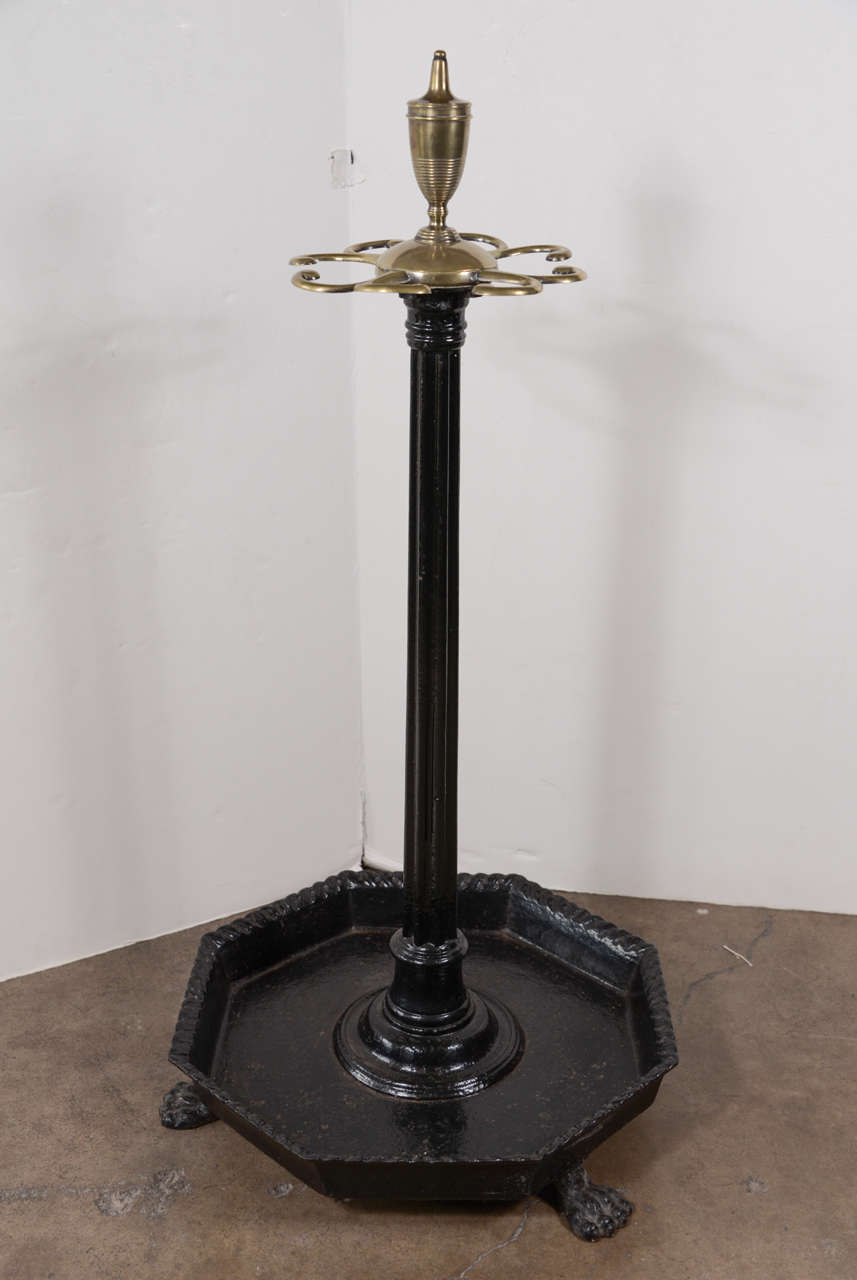 19th century Coalbrookdale cast iron brass stick stand from a country estate, circa 1840-1860. One of the earliest cast iron pieces of this type. Within England, the Coalbrookdale Company was the most prestigious and important manufacturer of cast