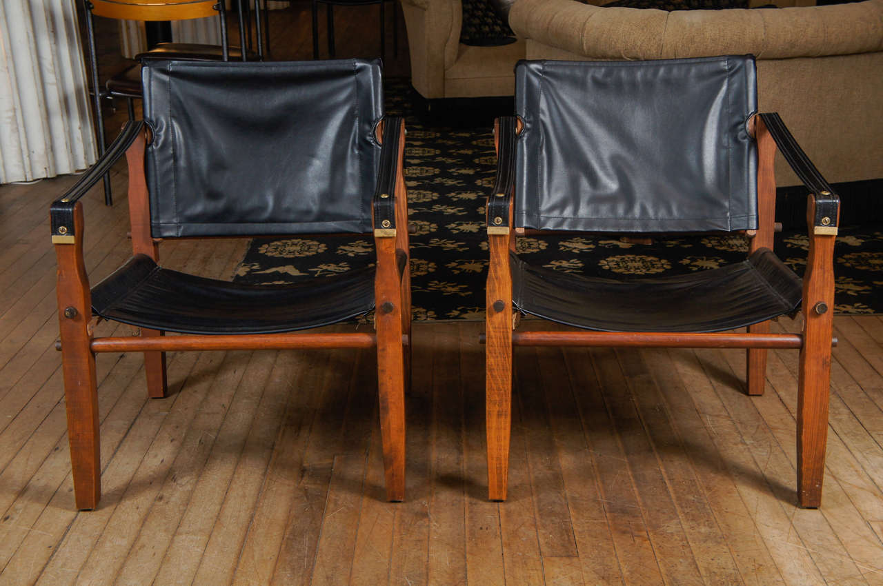 Pair of teak and black vinyl folding chairs - Gold Medal Racine, Wis.