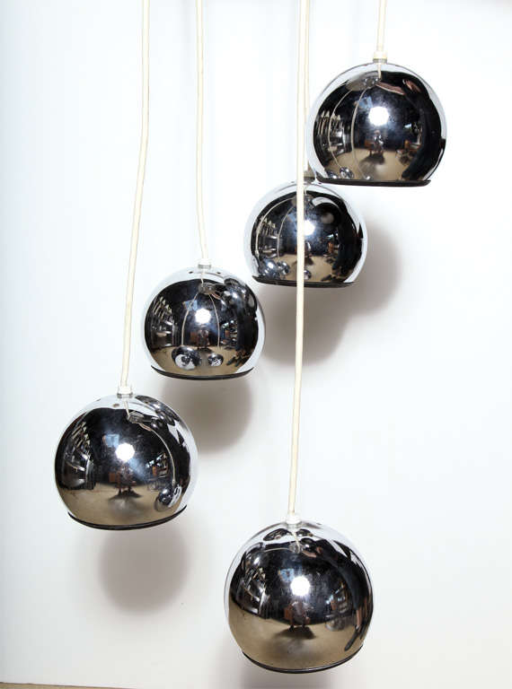 Original Italian Modern Goffredo Reggiani Chrome Eyeball Pendant, circa 1960. Featuring reflective spiral tiered Chrome globes with black matte interiors and round Chrome cap. White coated cords. Small footprint. Great for compact area. Statement