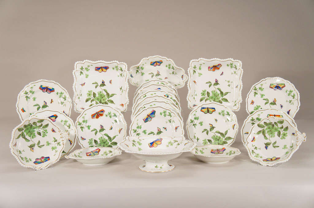 This wonderful 19th century Flight, Barr and Barr Worcester hand-painted dessert service is decorated with uniquely painted botanical decoration and each piece has a butterfly in flight. The apple green theme sets the color scheme on a clean white