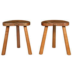 A pair of early Rober "Mouseman" Thompson Oak Milking Stools.
