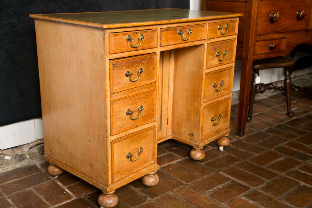 This little desk would make an excellent vanity. While it probably didn't have a leather top in its earliest iteration, it has been raised in both appearance and stature, as casters have been retrofitted to the bun feet (probably at the same time as