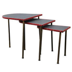 Set of 1950's nesting tables by Jacques Adnet
