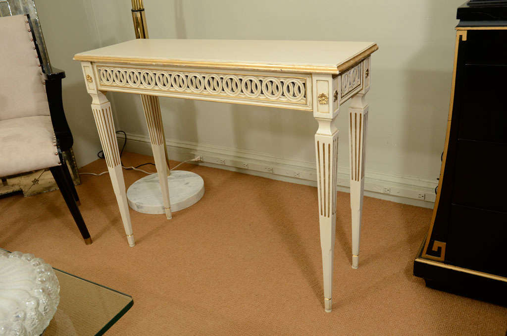 This intricately detailed console table is a great scale for narrow entries.