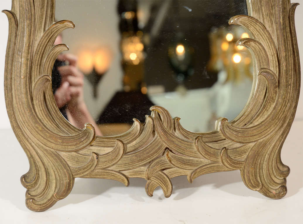 Tabletop Standing Mirror<br />
with Hand Carved Gilt  Stylized<br />
Feather Scroll Motif.