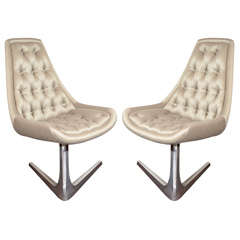Pair of Modernist Tufted Swivel Chairs