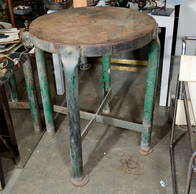 This table is an amazing example of an early American industrial piece. It has a beautiful original surface. Would be a great sculpture stand.